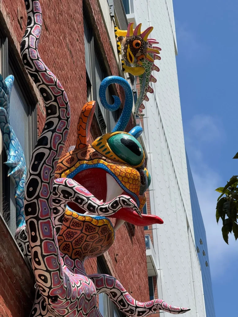 The exhibit Magical Mexico in Motion, conceived by renowned Mexican sculptor Fernando Escartiz, features seven large-format sculptures adorning the facade of the consular building. Photo: Fernando Escartiz