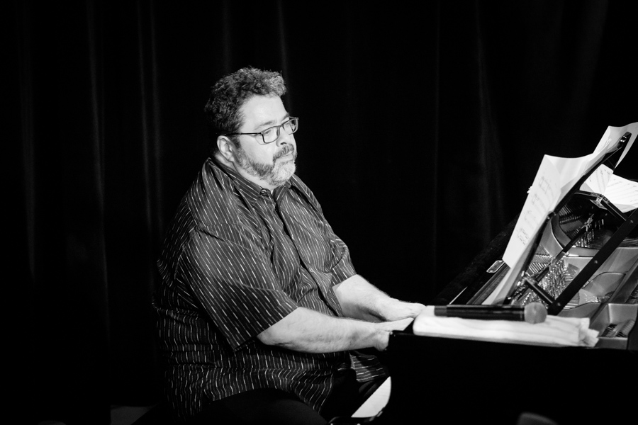 rturo O'Farrill plays the grand piano during a concert with his quintet at the Oslo Jazz Festival in 2018, in black and white.