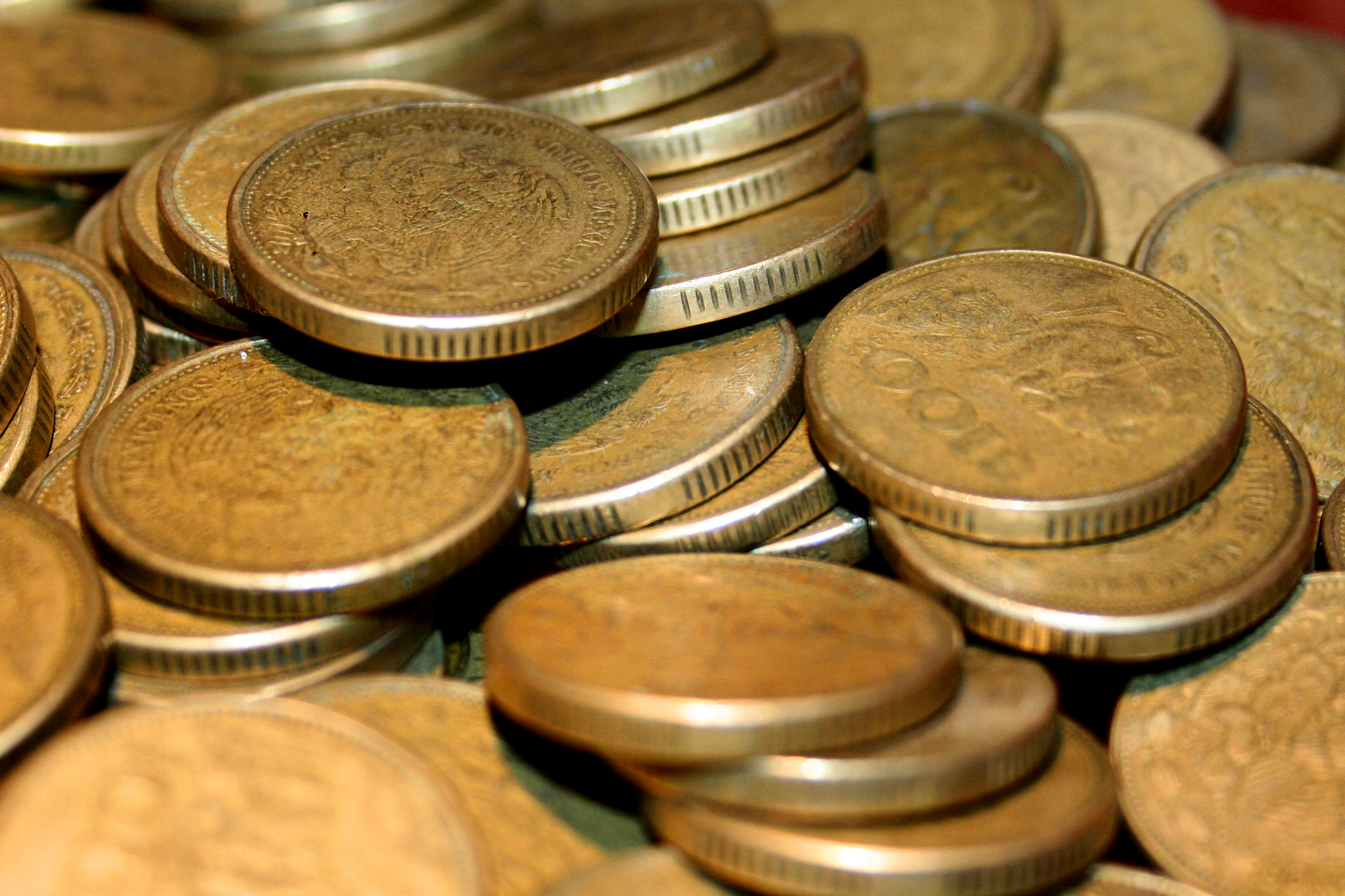 A pile of Mexican peso coins